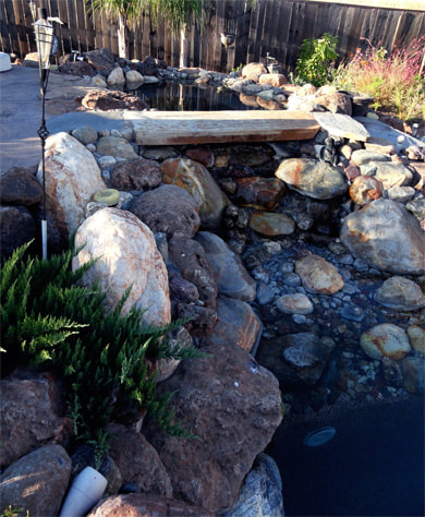 Natural pool with rocks and boulders